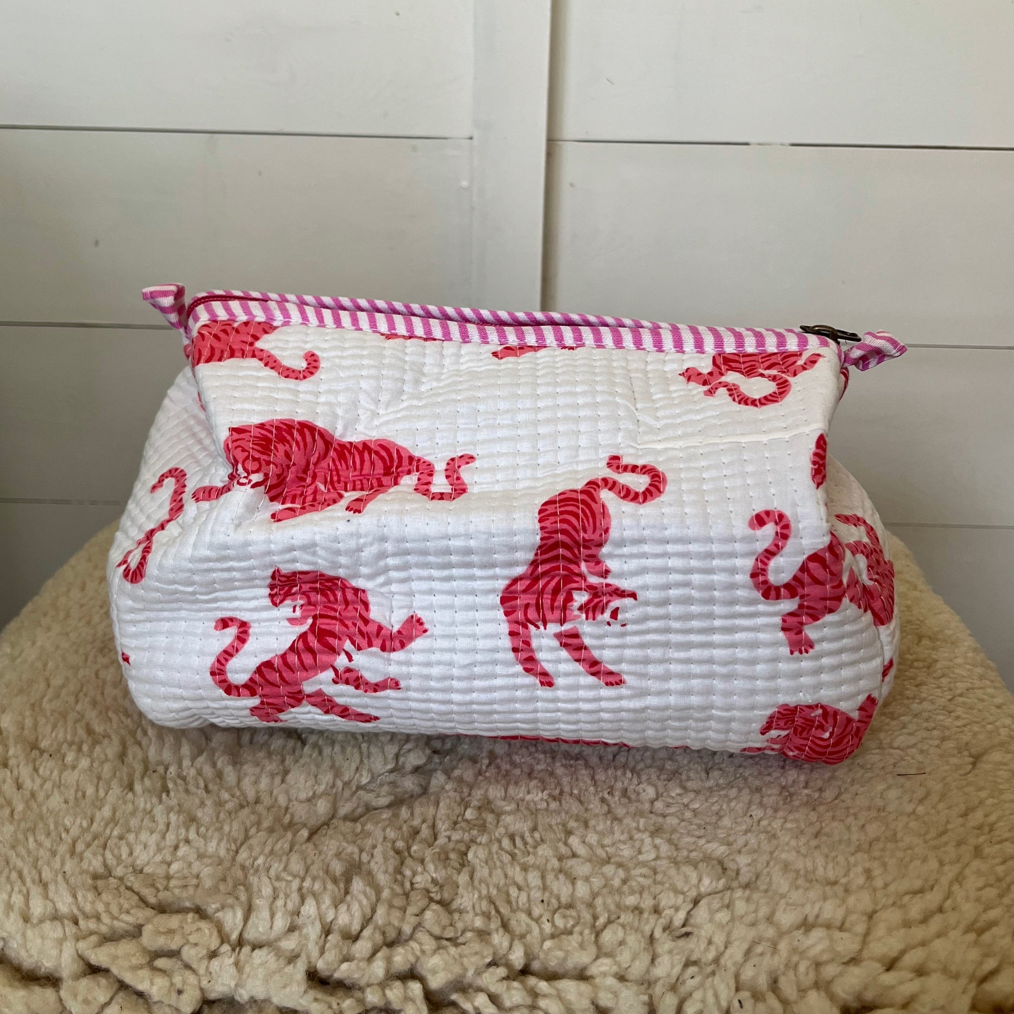 White/pink leopard washbag